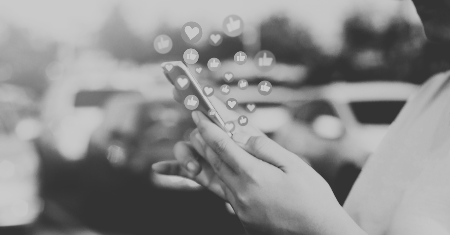 Closeup young woman using the smart mobile phone for social